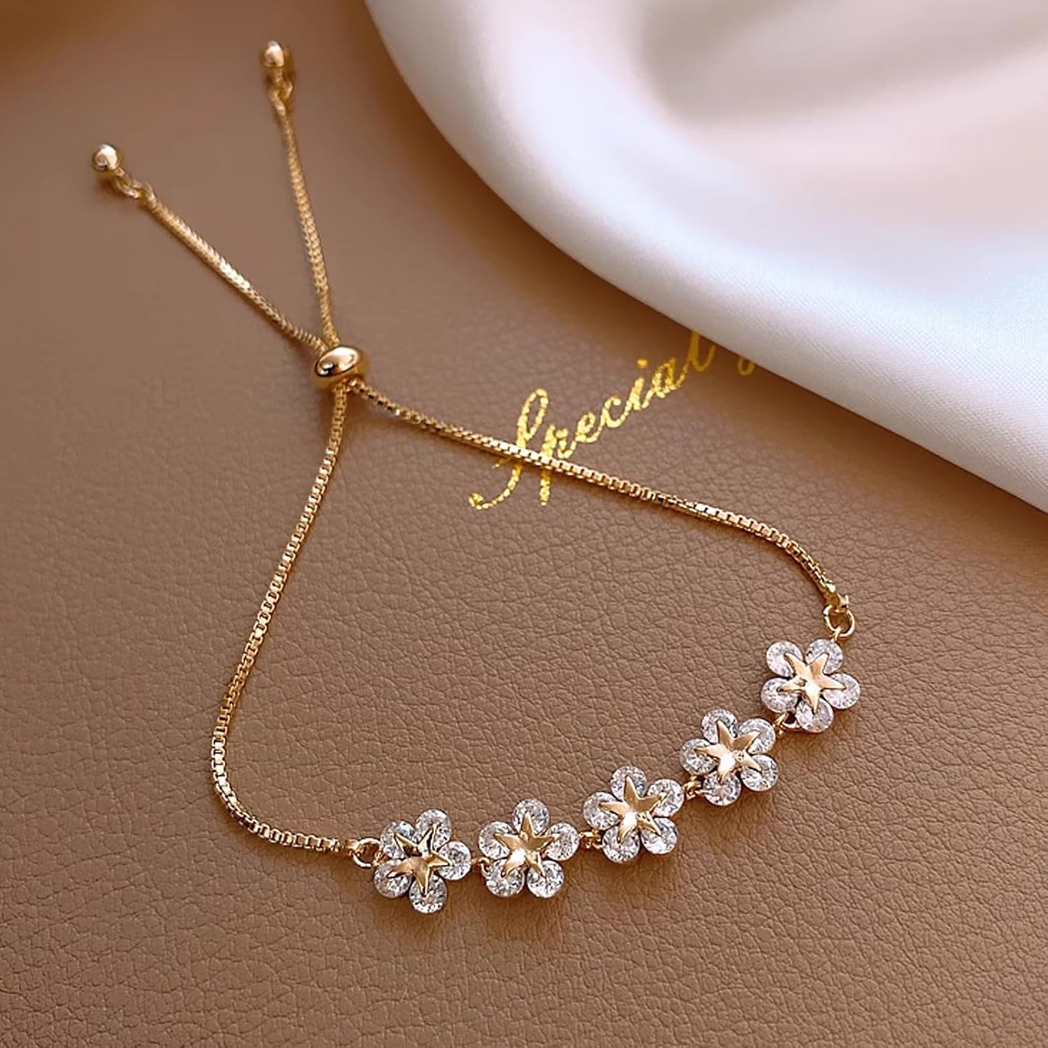 Pulsera de perlas ajustable para mujer, cadena floral dorada con piedras de circonita brillante
